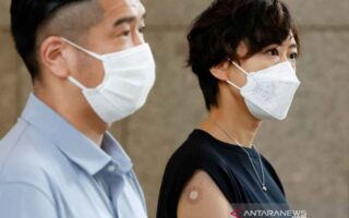 2021-06-25T053733Z_903580918_RC2G7O9BLA52_RTRMADP_3_OLYMPICS-2020-JAPAN-VACCINE Jepang resmi melarang vaksinasi covid 19 berbasis mrna